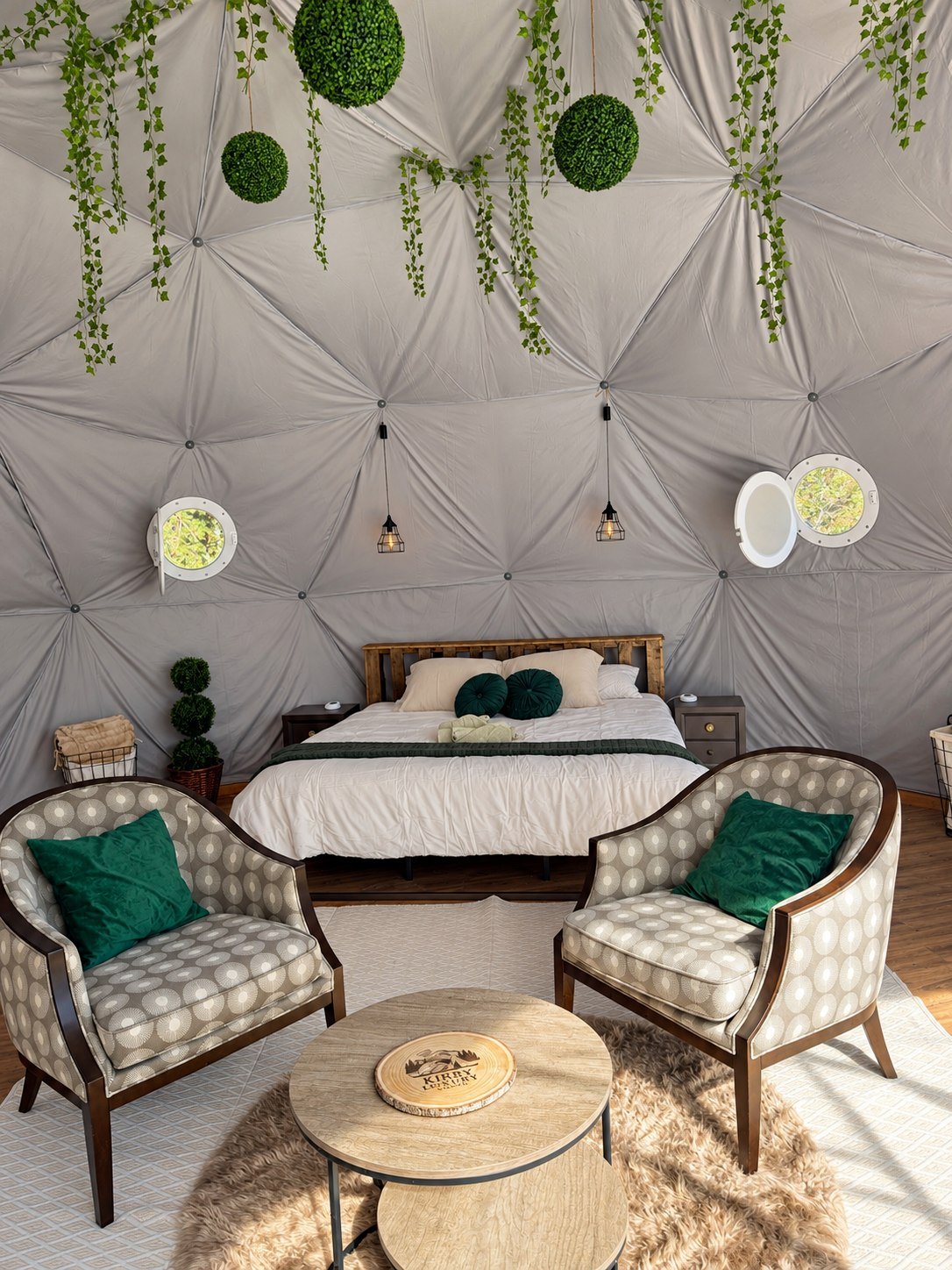 King bed and sitting area inside Dome 2 at Kirby Luxury Stays